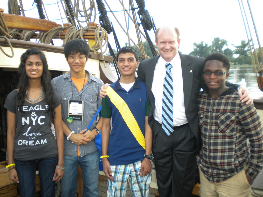 Pictured are, from left, Bansri Patel, Jaewoong Yoo, Priyen Patel, U.S. Sen. Chris Coons and Achille Tenkiang.